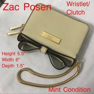 Zac Posen bow tie clutch wallet.